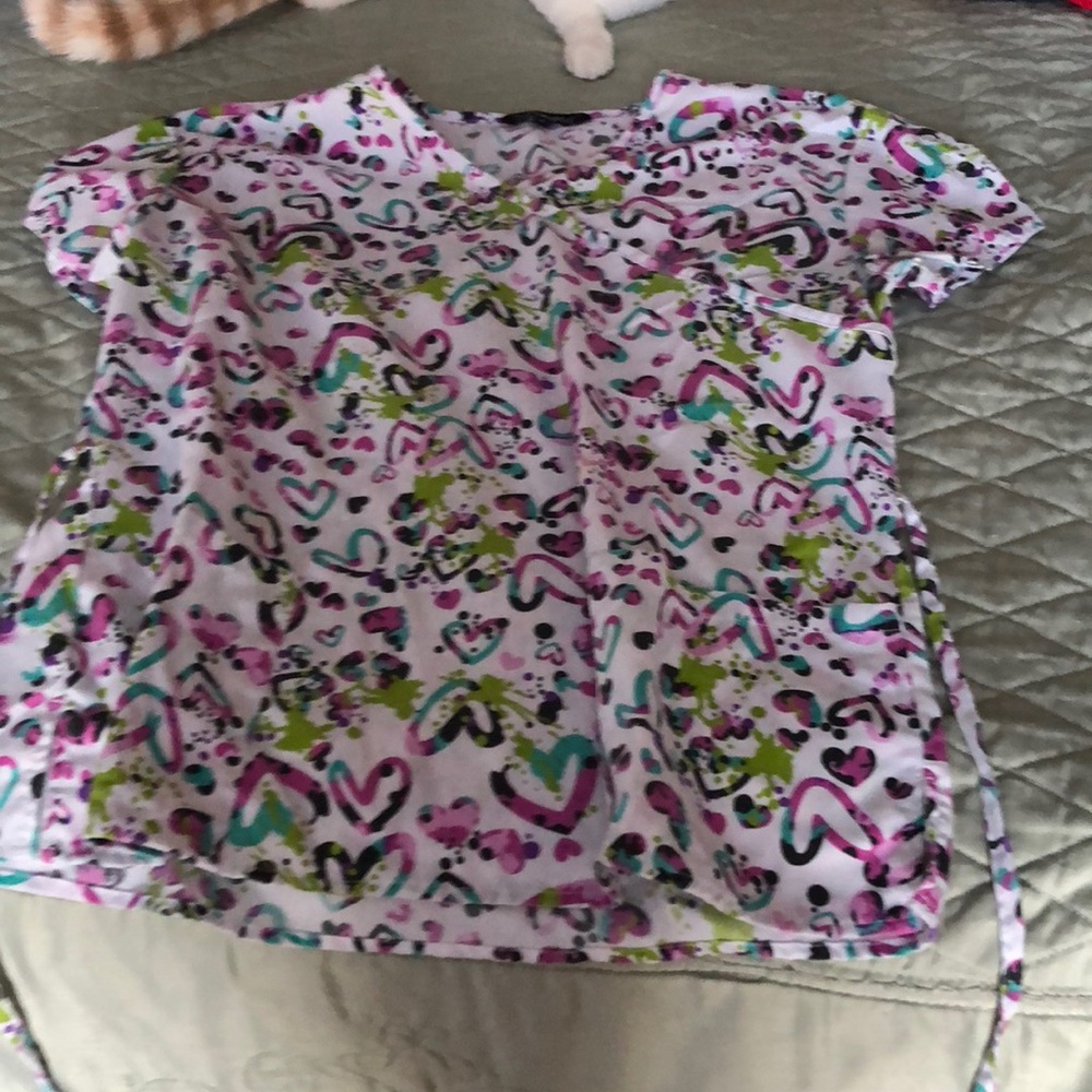 Cassandra O scrub top